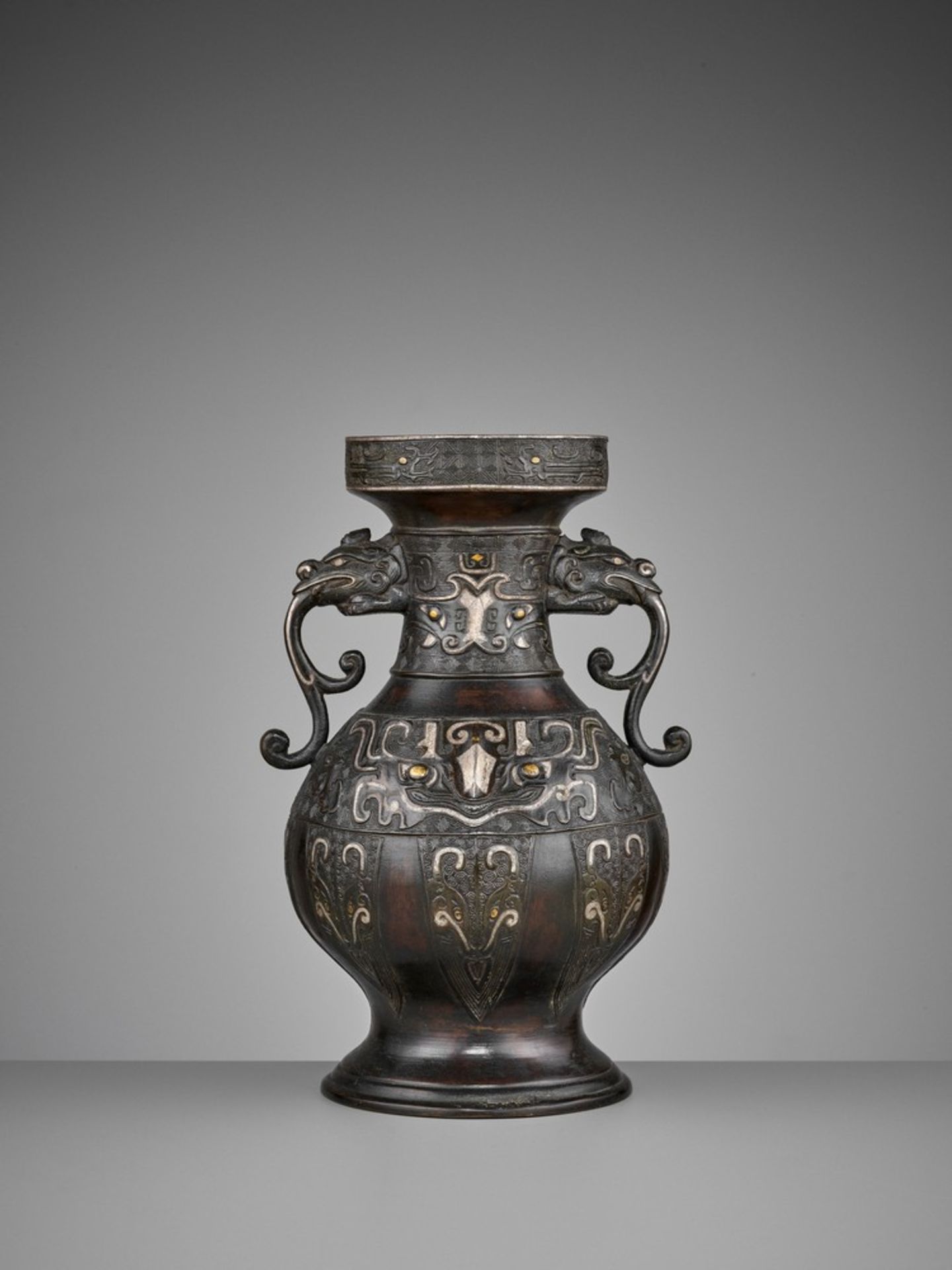 A GOLD AND SILVER INLAID BRONZE VASE, HU, MING DYNASTY