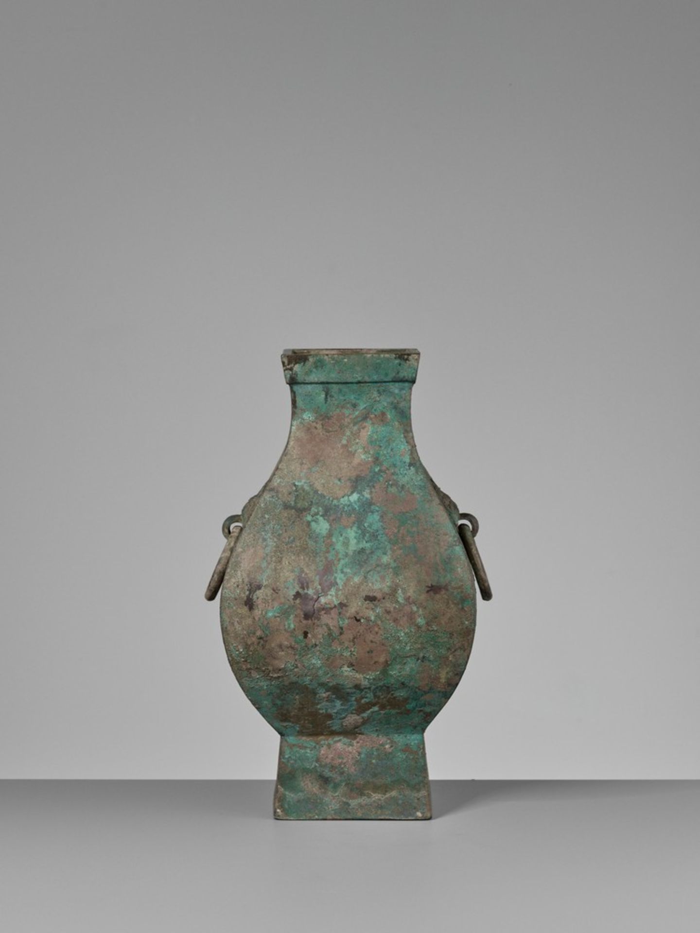 A FACETED BRONZE STORAGE VESSEL, FANGHU, HAN DYNASTY China, 206 BC-AD 220. The faceted pear-shaped - Image 8 of 20