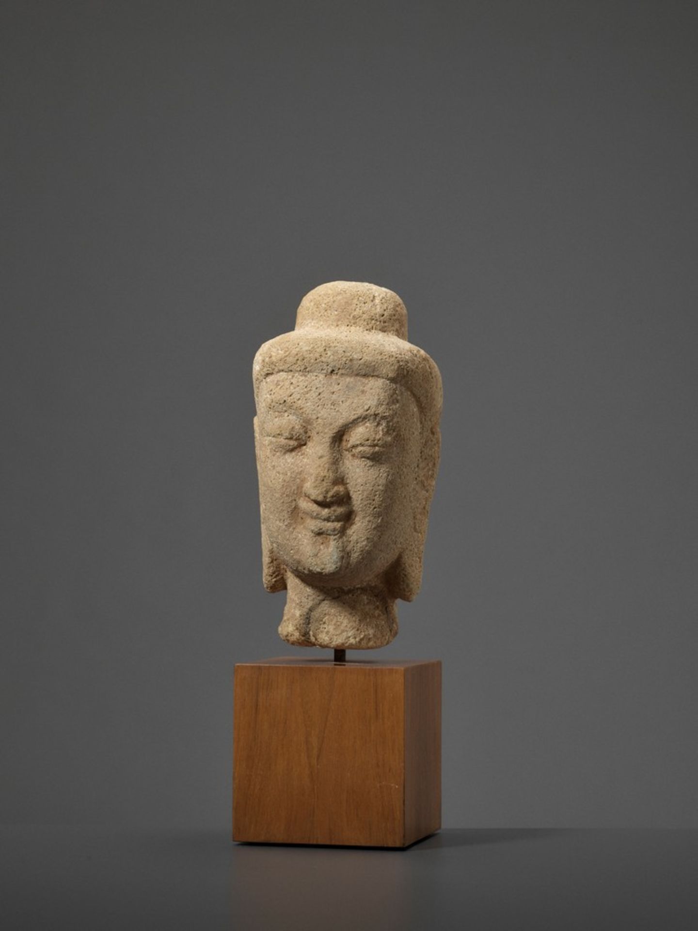 A RARE SANDSTONE HEAD OF BUDDHA, NORTHERN WEI DYNASTY, 5TH-6TH CENTURY