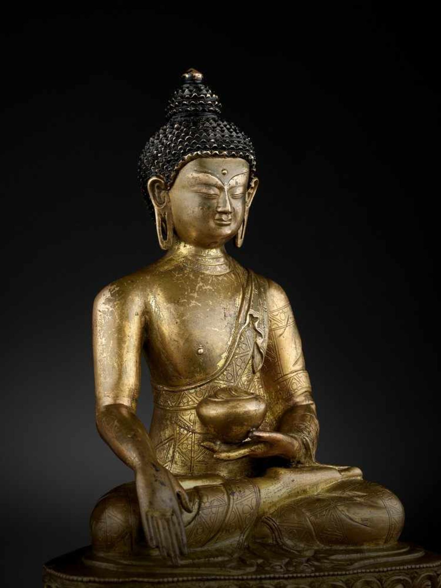 A GILT-BRONZE FIGURE OF BUDDHA SHAKYAMUNI, BEIJING OR INNER MONGOLIA, 17TH CENTURY - Image 2 of 11