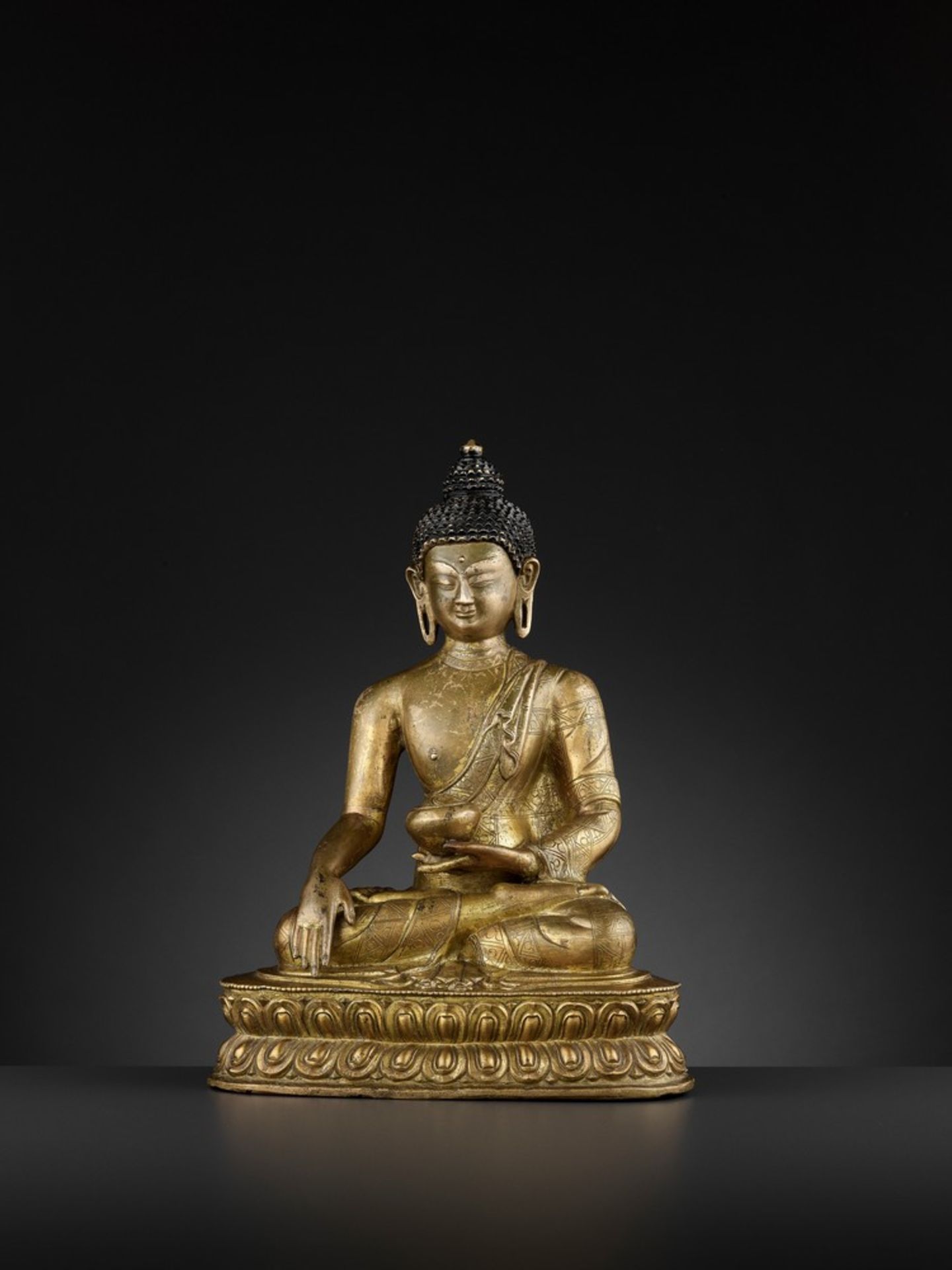 A GILT-BRONZE FIGURE OF BUDDHA SHAKYAMUNI, BEIJING OR INNER MONGOLIA, 17TH CENTURY - Image 3 of 11