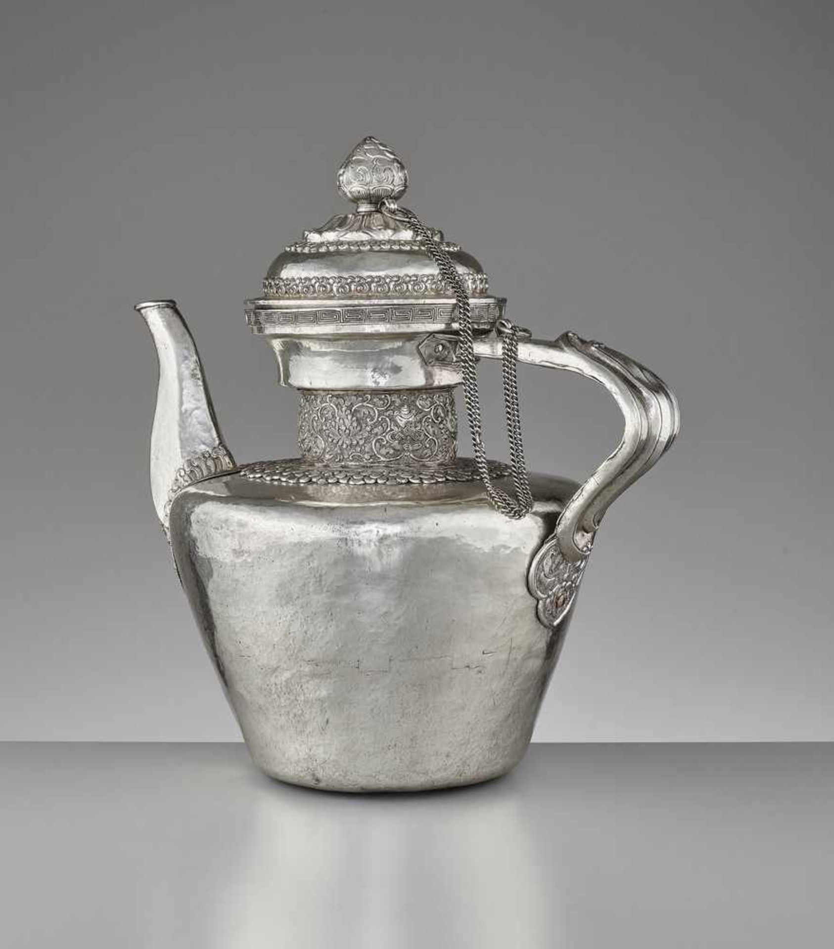 A LARGE SILVER TEAPOT AND COVER, QING DYNASTY