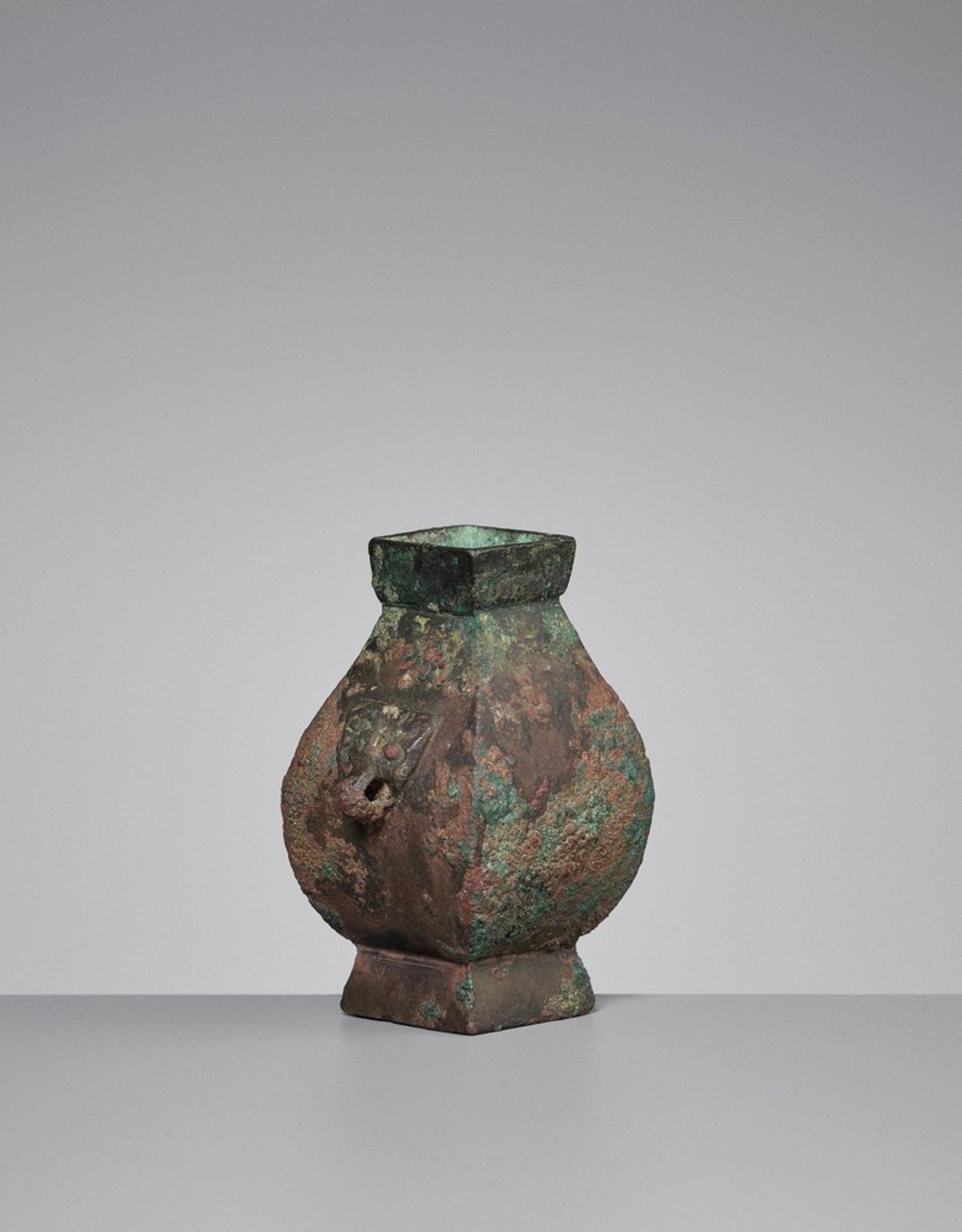 A MINIATURE BRONZE VESSEL, FANGHU, HAN DYNASTY