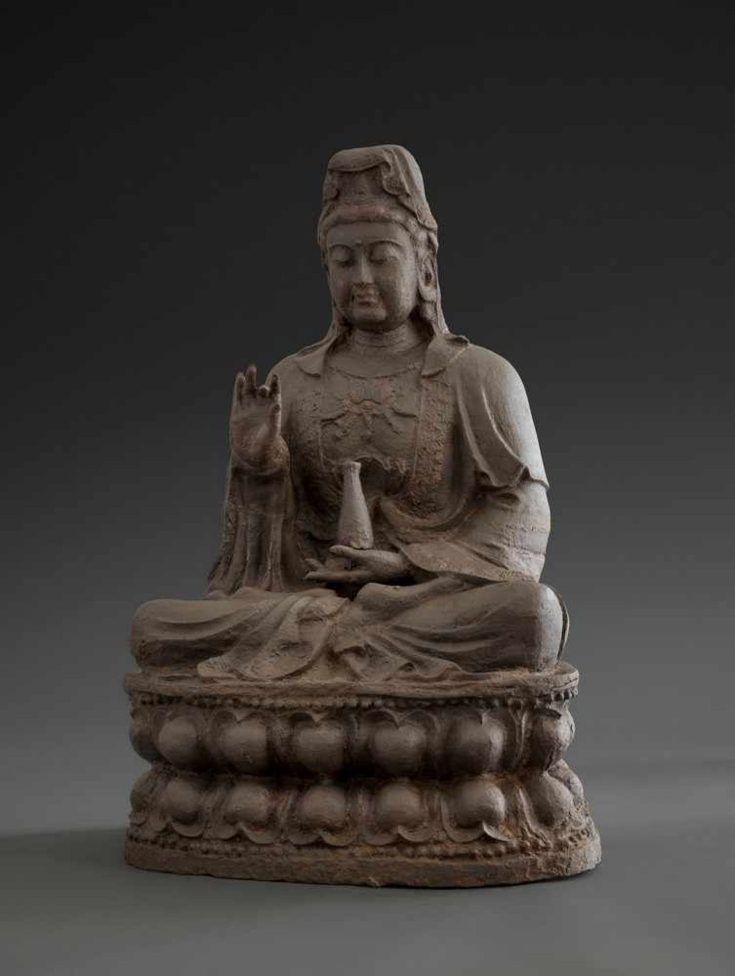 A MONUMENTAL CAST-IRON STATUE OF THE TEACHING GUANYIN, YUAN-MING DYNASTY