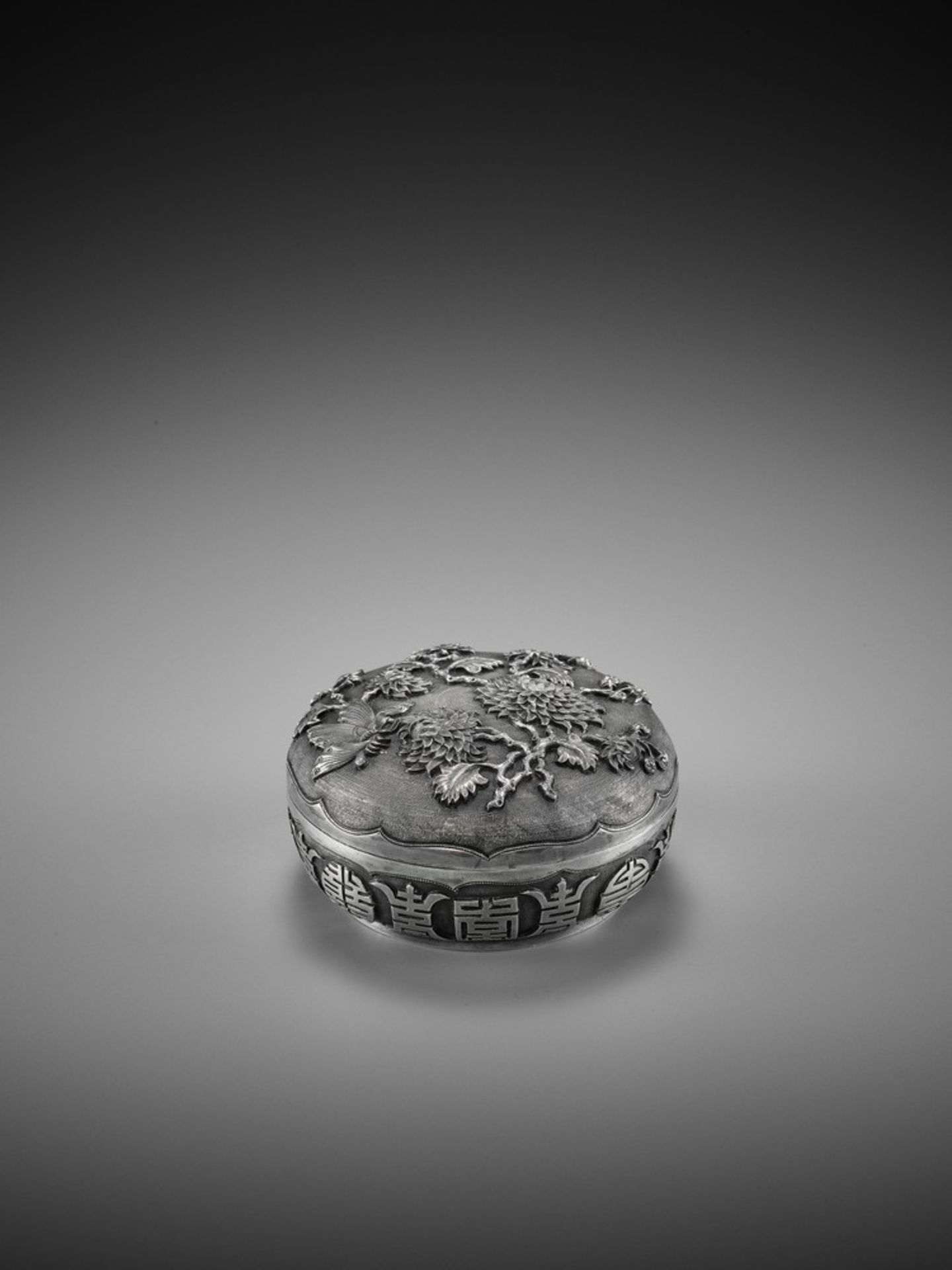 A ‘CHRSANTHEMUM AND BUTTERFLIES’ SILVER BOX, QING <br