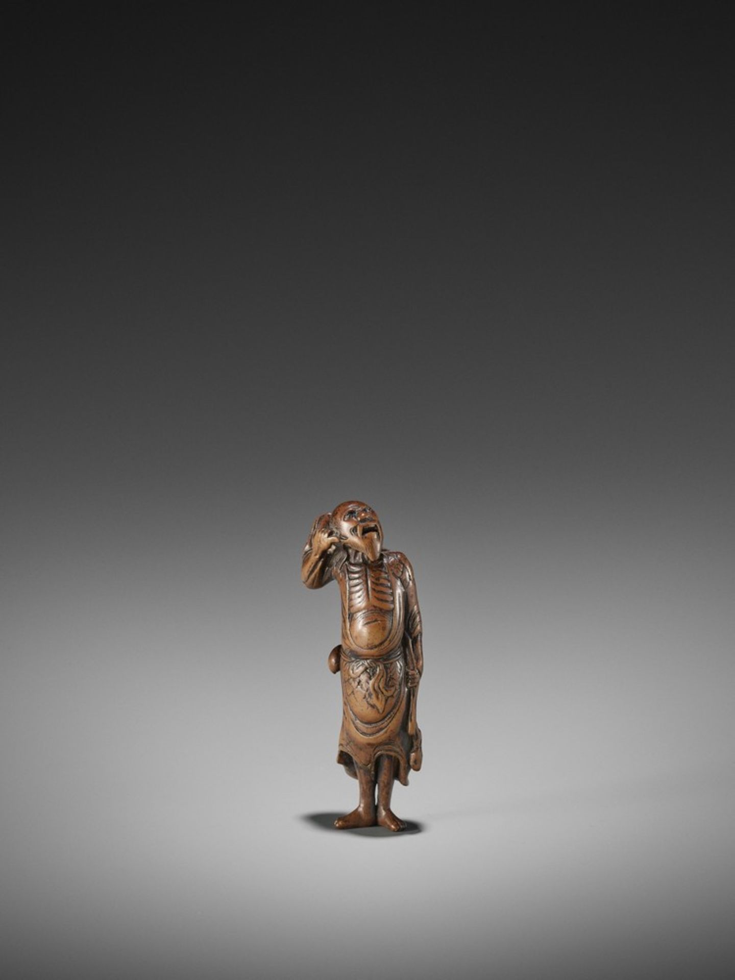 A WOOD NETSUKE OF TEKKAI SENNIN UnsignedJapan, 18th century, Edo period (1615-1868)A spirited old - Bild 2 aus 10