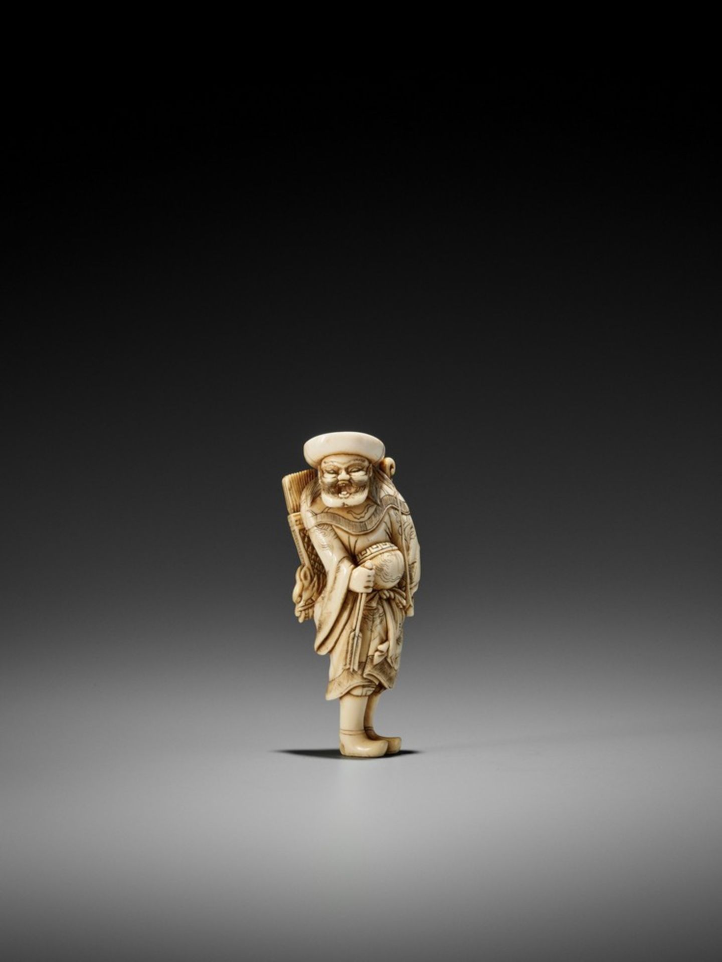 MITSUHARU: AN IVORY NETSUKE OF A TARTAR ARCHER By Mitsuharu, unsignedJapan, Kyoto, late 18th