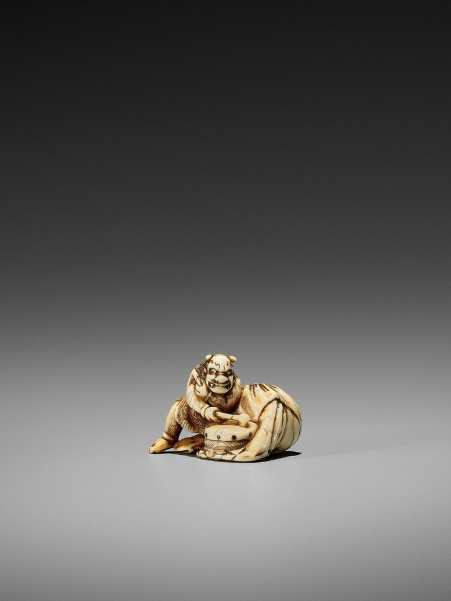 MITSUTOSHI: AN IVORY NETSUKE OF RAIJIN By Mitsutoshi, signed Mitsutoshi 光利Japan, late 18th to