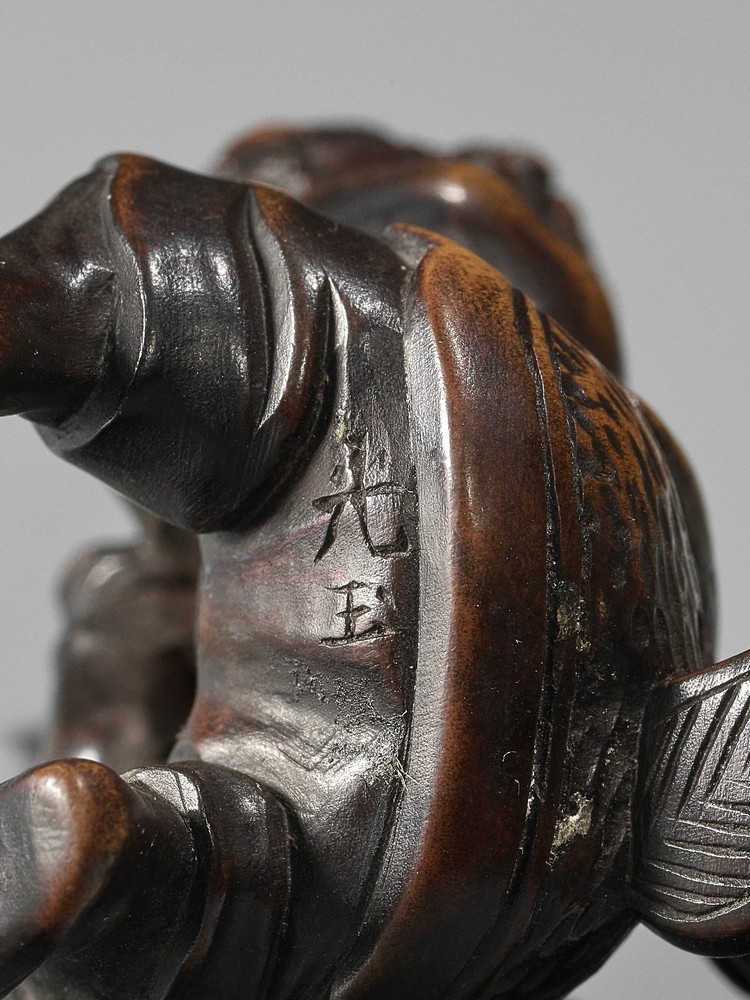 KOGYOKU: A FINE WOOD NETSUKE OF AN ONI STEALING SHOKI’S BELONGINGS By Kogyoku, signed Kogyoku - Image 7 of 8