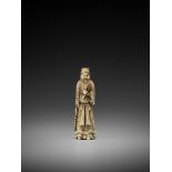 A LARGE IVORY NETSUKE OF KAN’U UnsignedJapan, late 18th century, Edo period (1615-1868)The god of