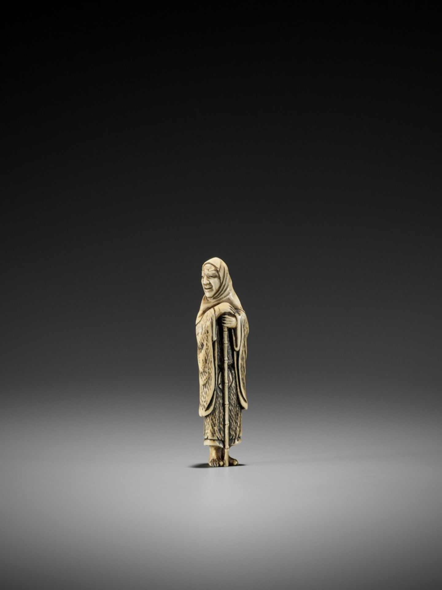 A VERY RARE IVORY NETSUKE OF A FOX PRIEST (HAKUZOSU) UnsignedJapan, 18th century, Edo period (1615-