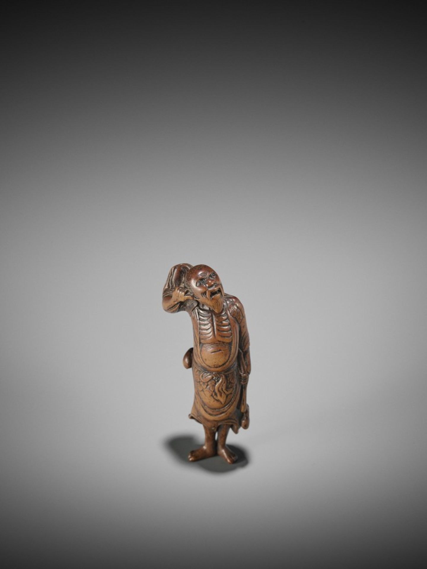 A WOOD NETSUKE OF TEKKAI SENNIN UnsignedJapan, 18th century, Edo period (1615-1868)A spirited old - Bild 9 aus 10