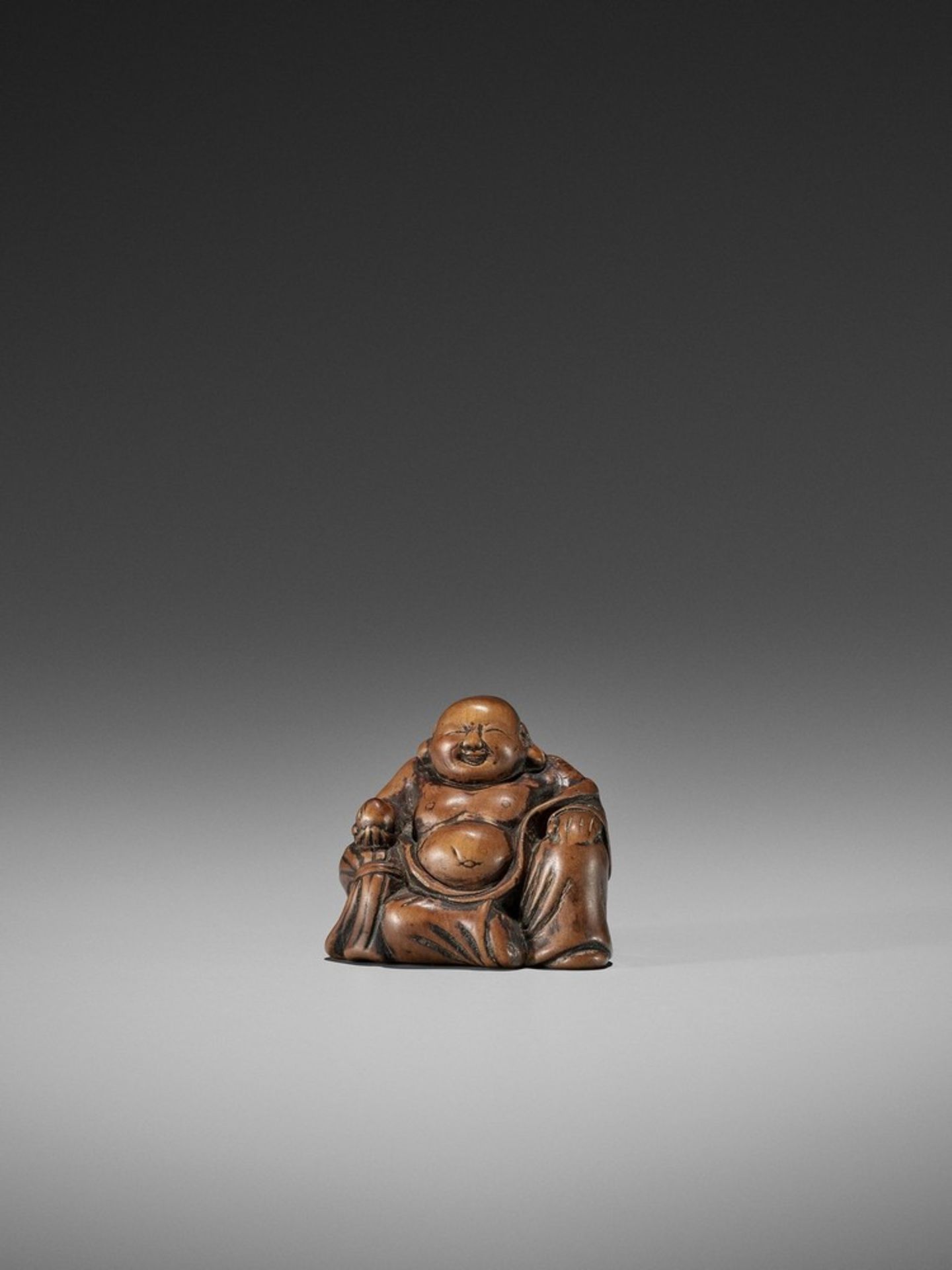 A RARE AND EARLY WOOD NETSUKE OF HOTEI UnsignedJapan, early to mid-18th century, Edo period (1615-