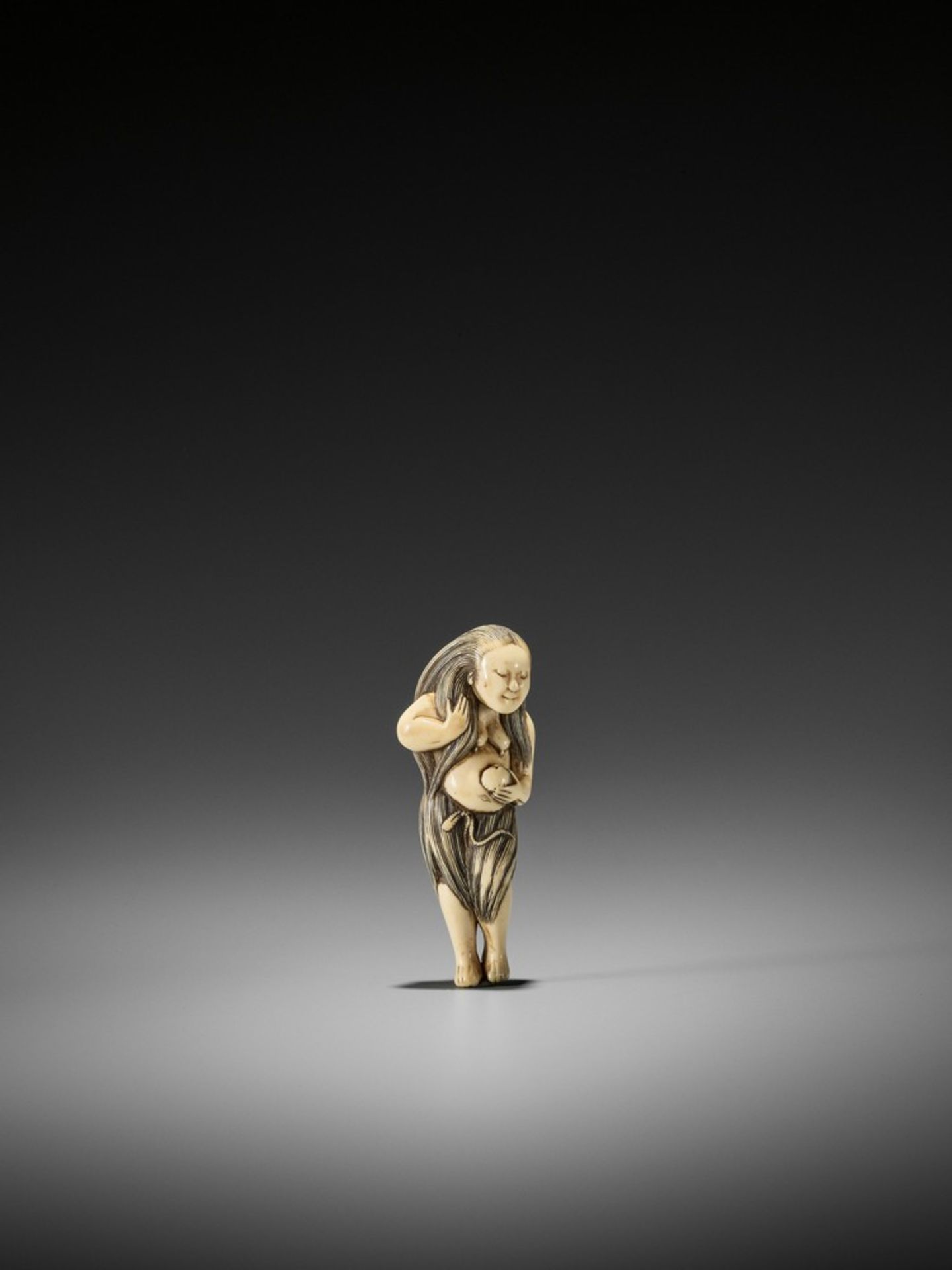 AN EXQUISITE IVORY NETSUKE OF A DIVING GIRL (AMA) UnsignedJapan, 18th century, Edo period (1615-