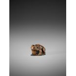 AN EARLY WOOD NETSUKE OF A TOAD UnsignedJapan, 18th century, Edo period (1615-1868)Published: