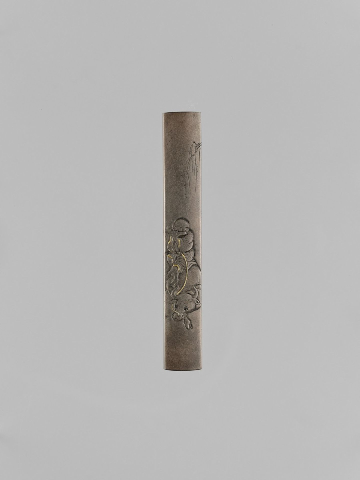 ICHIMUDO TERUTATSU: A GOLD-INLAID SHIBUICHI KOZUKA WITH OX AND BOKUDO By Ichimudo Terutatsu (b.