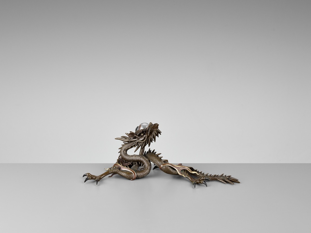 A BRONZE OKIMONO OF A DRAGON WITH ROCK CRYSTAL BALL Japan, Meiji period (1868-1912)Finely cast as - Image 4 of 10