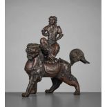 A BRONZE GROUP OF KISHI MONJU BOSATSU RIDING A SHISHI Japan, 18th century, Edo period (1615-1868)