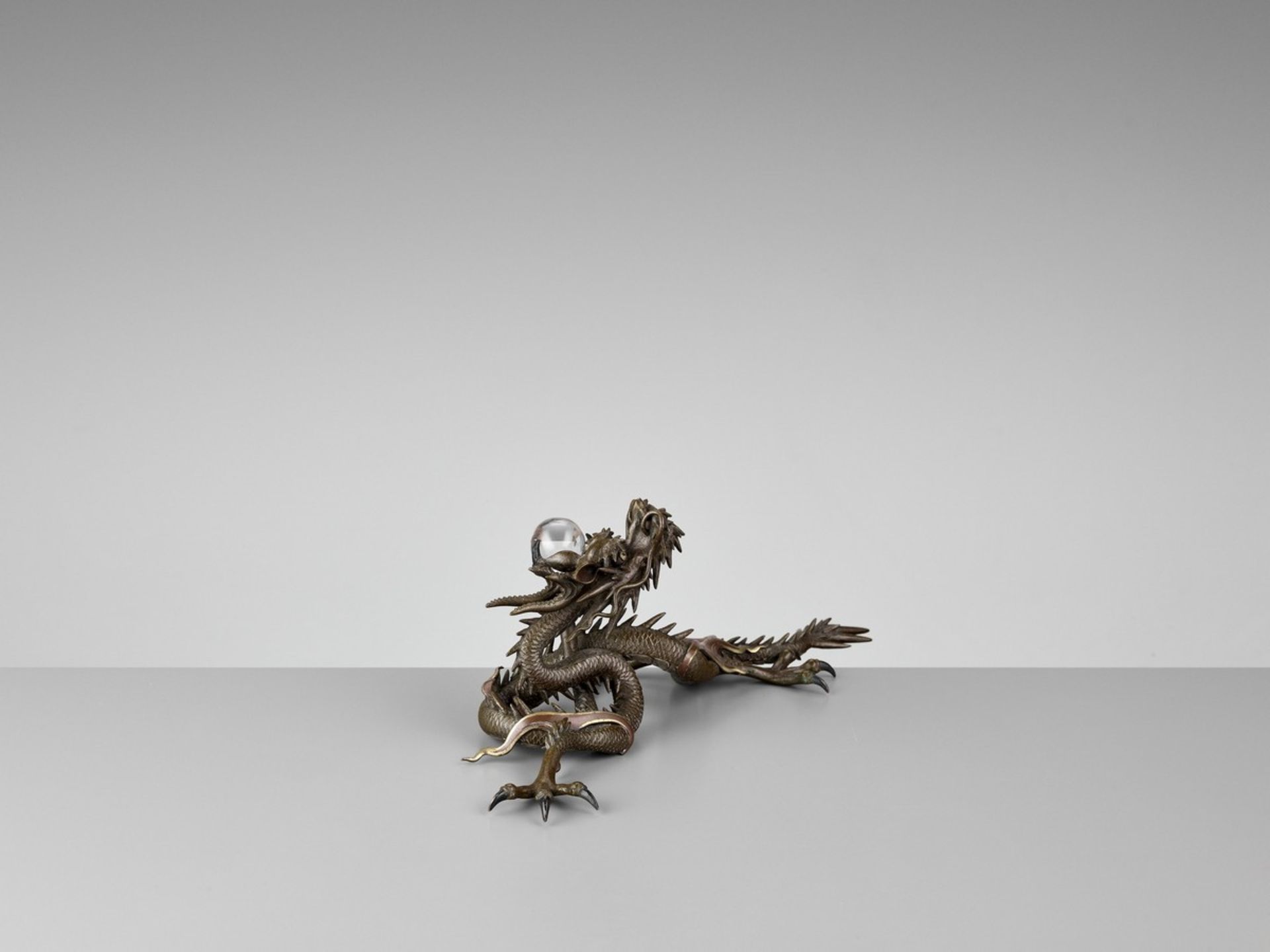 A BRONZE OKIMONO OF A DRAGON WITH ROCK CRYSTAL BALL Japan, Meiji period (1868-1912)Finely cast as - Bild 8 aus 10