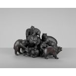 UNKOKU: AN EXTREMELY RARE PATINATED OKIMONO GROUP OF HIMALAYAN BROWN BEARS IN A PILE By Unkoku,