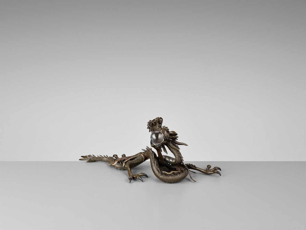 A BRONZE OKIMONO OF A DRAGON WITH ROCK CRYSTAL BALL Japan, Meiji period (1868-1912)Finely cast as - Image 7 of 10