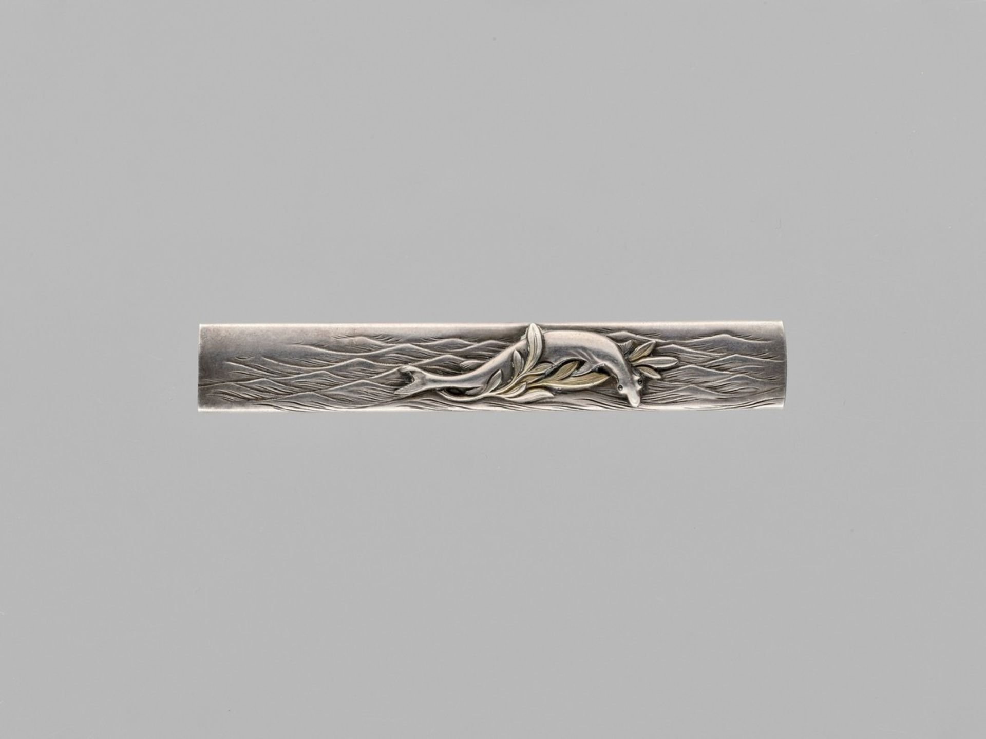 MUNEYOSHI: A RARE SILVER KOZUKA By Muneyoshi, signed Muneyoshi seiJapan, 19th century, Edo period (