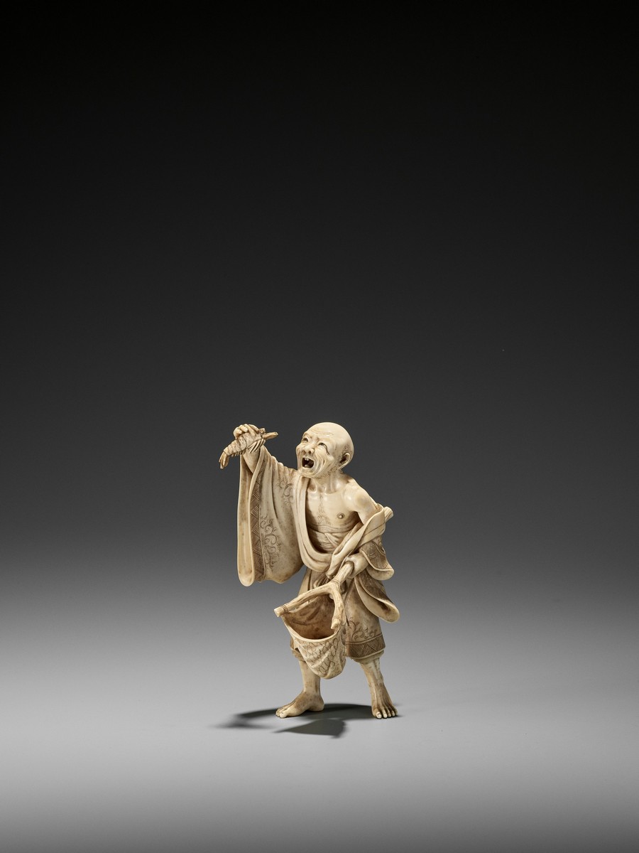 MASAYOSHI: AN IVORY OKIMONO OF A MONK CATCHING A LOBSTER By Masayoshi, signed Seppo-do