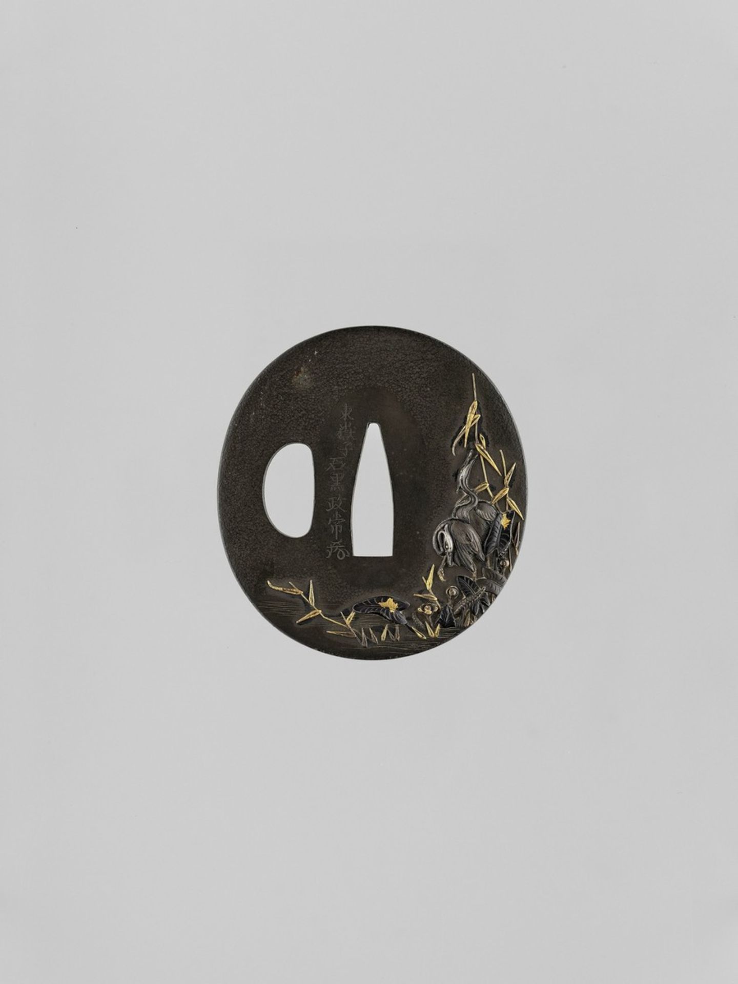 ISHIGURO MASATSUNE II: A GOLD-INLAID ISHIGURO SCHOOL SHIBUICHI TSUBA WITH HERONS By Ishiguro