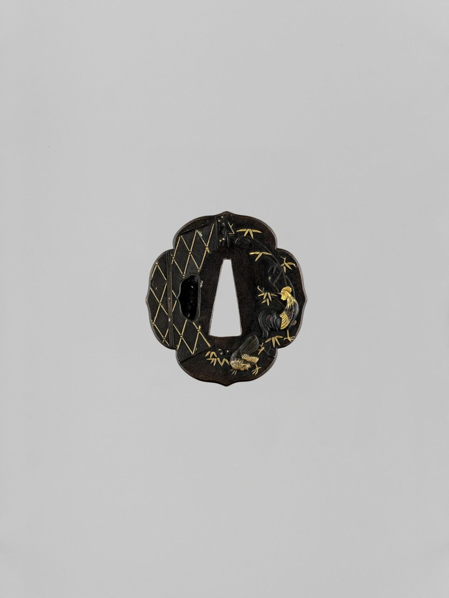 A FINE GOLD-INLAID SHAKUDO TSUBA WITH COCKERELS Japan, 19th century, Edo period (1615-1868)Of aoi-