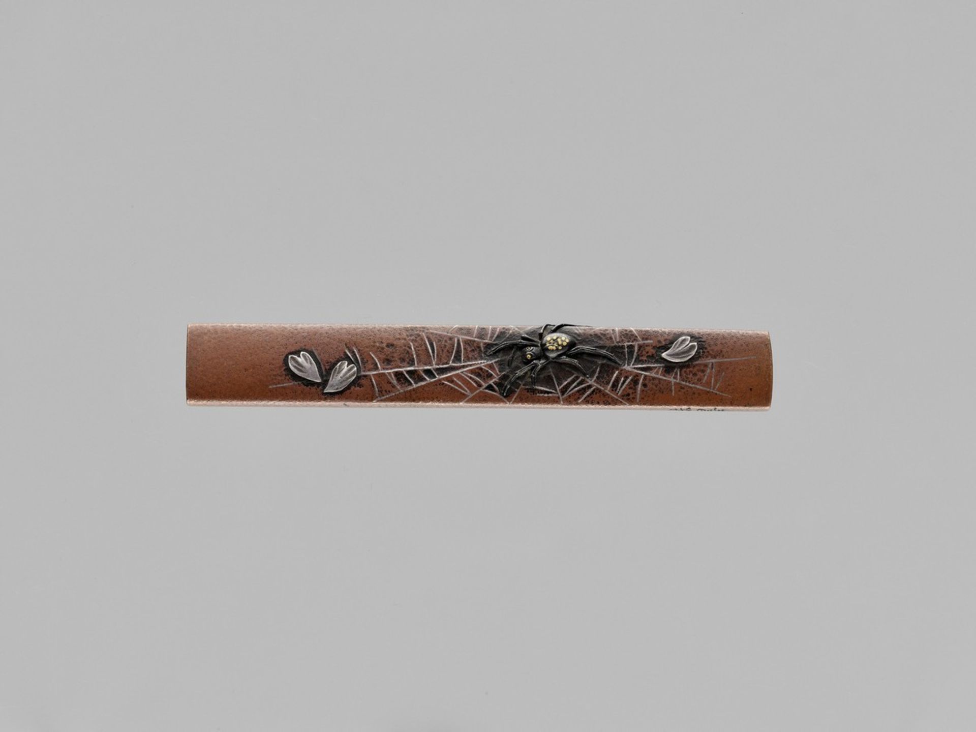 OTSURYUKEN MIBOKU: A RARE COPPER KOZUKA WITH SPIDER By Otsuryuken Miboku, signed MibokuJapan, 19th