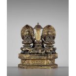 A GOLD LACQUERED SHRINE WITH TWO SEATED BUDDHAS FLANKING A BUDDHIST STELE, LATE EDO Japan, c. 1750-