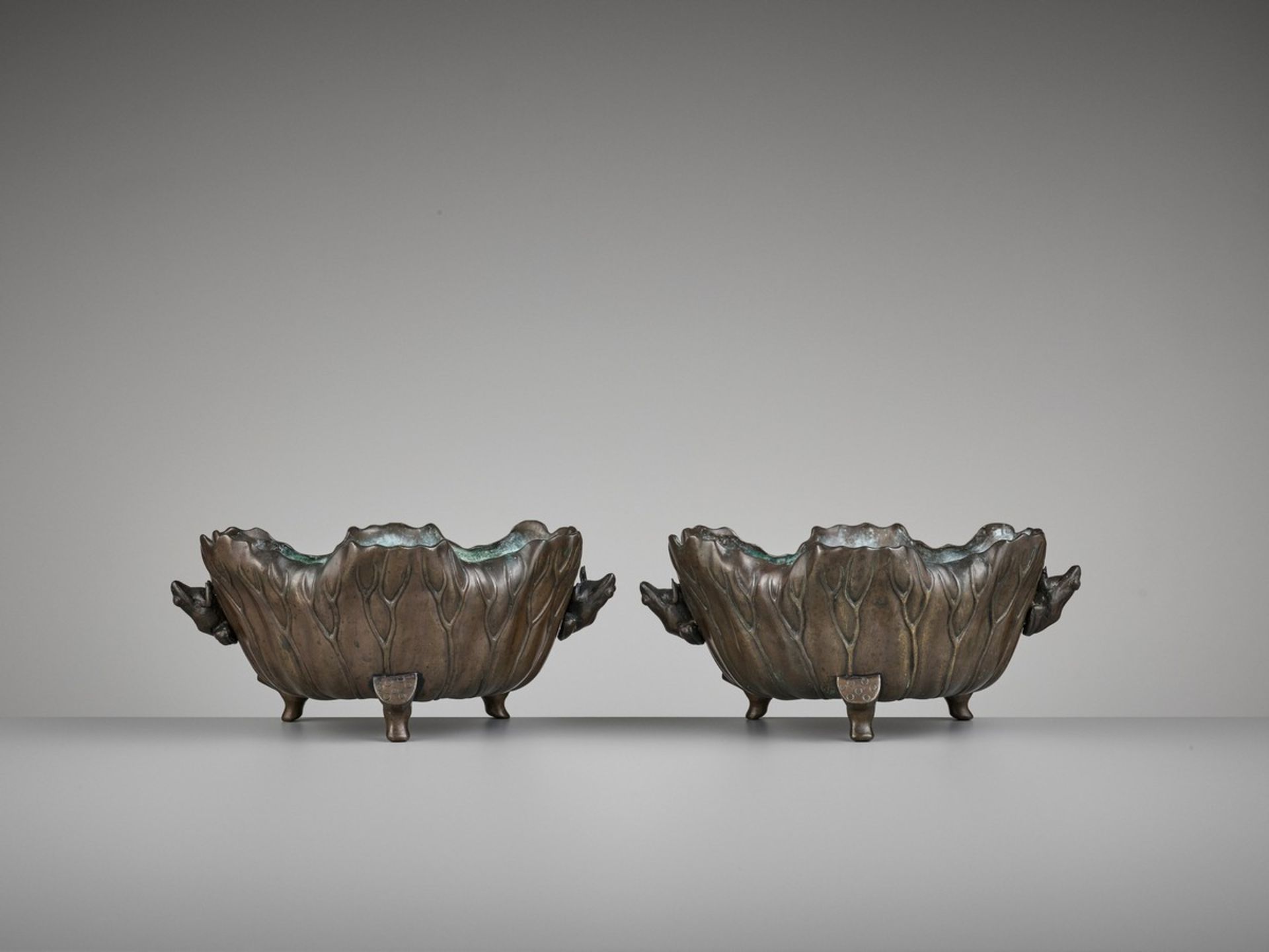 A PAIR OF BRONZE ‘LOTUS AND FROG’ WATER BASINS Japan, Meiji period (1868-1912)A pair of water basins