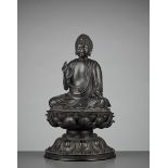 A MASSIVELY CAST BRONZE OF BUDDHA, 17TH-18TH CENTURY Japan, 17th-18th century, Edo period (1615-