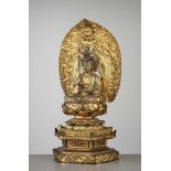 A LARGE AND COMPLETE GILT-LACQUERED WOOD STATUE OF KANNON BOSATSU Japan, Edo period (1615-1868)The