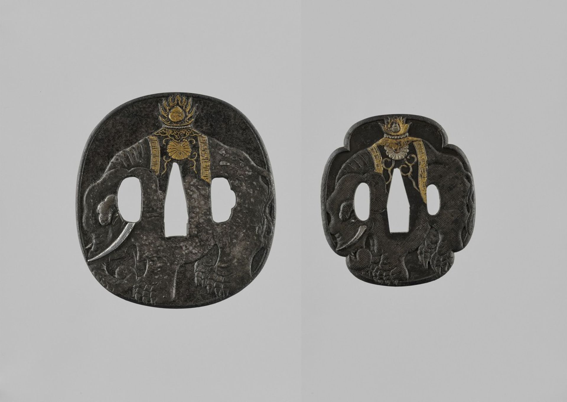 YASUCHIKA: A NARA IRON DAISHO TSUBA SET WITH ELEPHANTS By Yasuchika, signed YasuchikaJapan, 19th