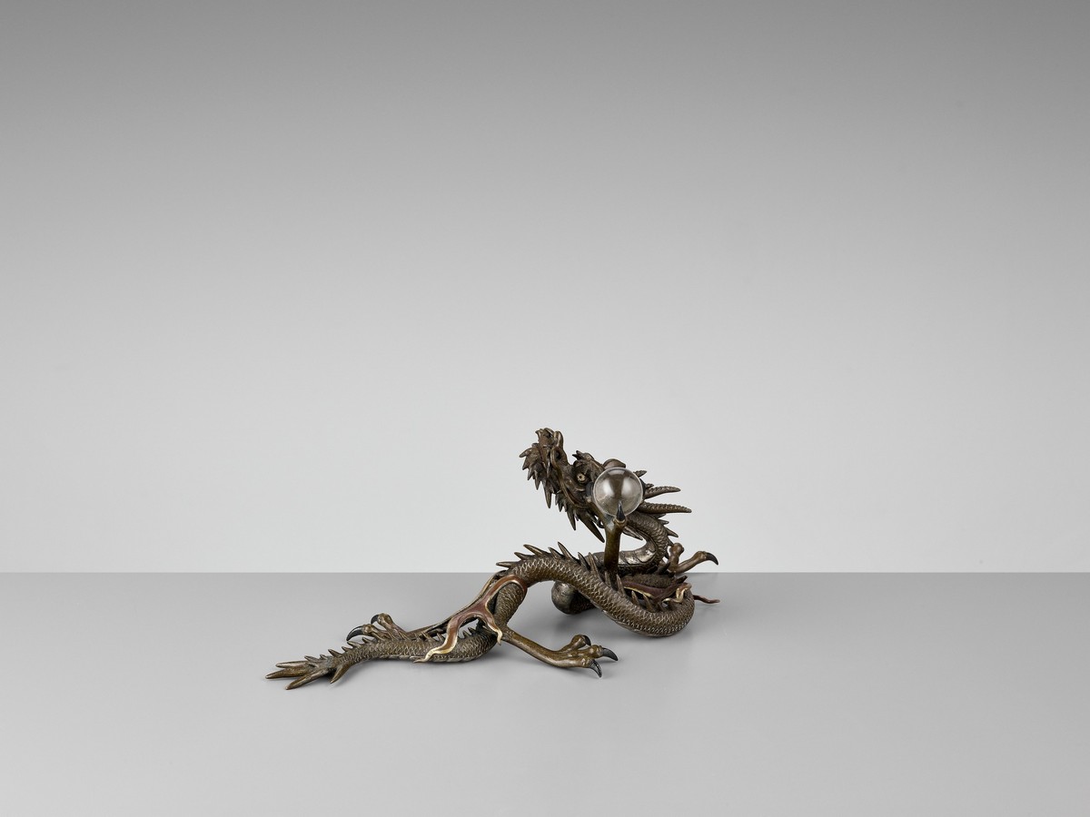 A BRONZE OKIMONO OF A DRAGON WITH ROCK CRYSTAL BALL Japan, Meiji period (1868-1912)Finely cast as - Image 2 of 10