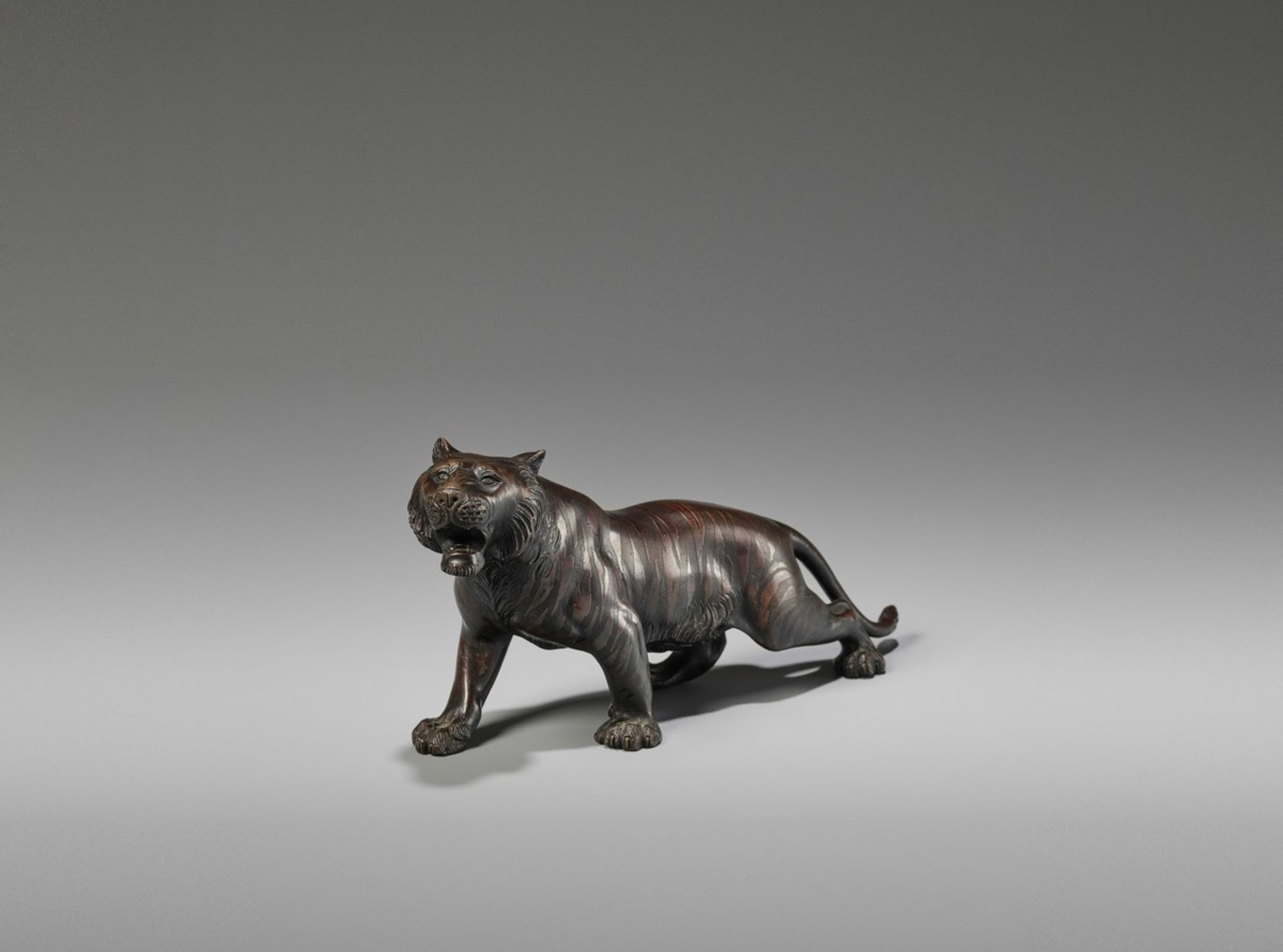 AKASOFU GYOKKO: A BRONZE OKIMONO OF A ROARING TIGER By Akasofu Gyokko, signed Gyokko sakuJapan,