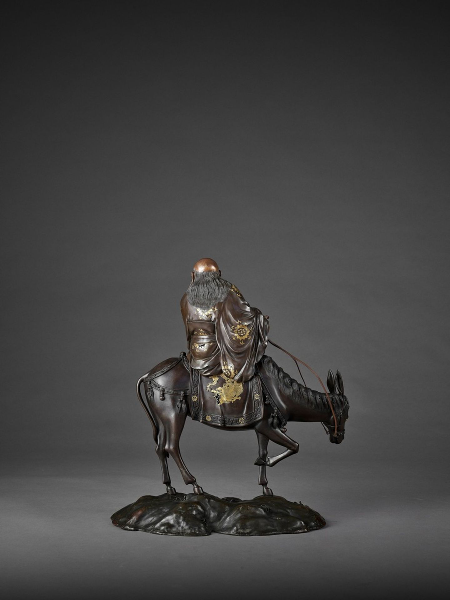 A SPECTACULAR AND MASSIVE PARCEL GILT BRONZE FIGURE OF TOBA SEATED ON A MULE Attributed to the Miyao - Image 7 of 12