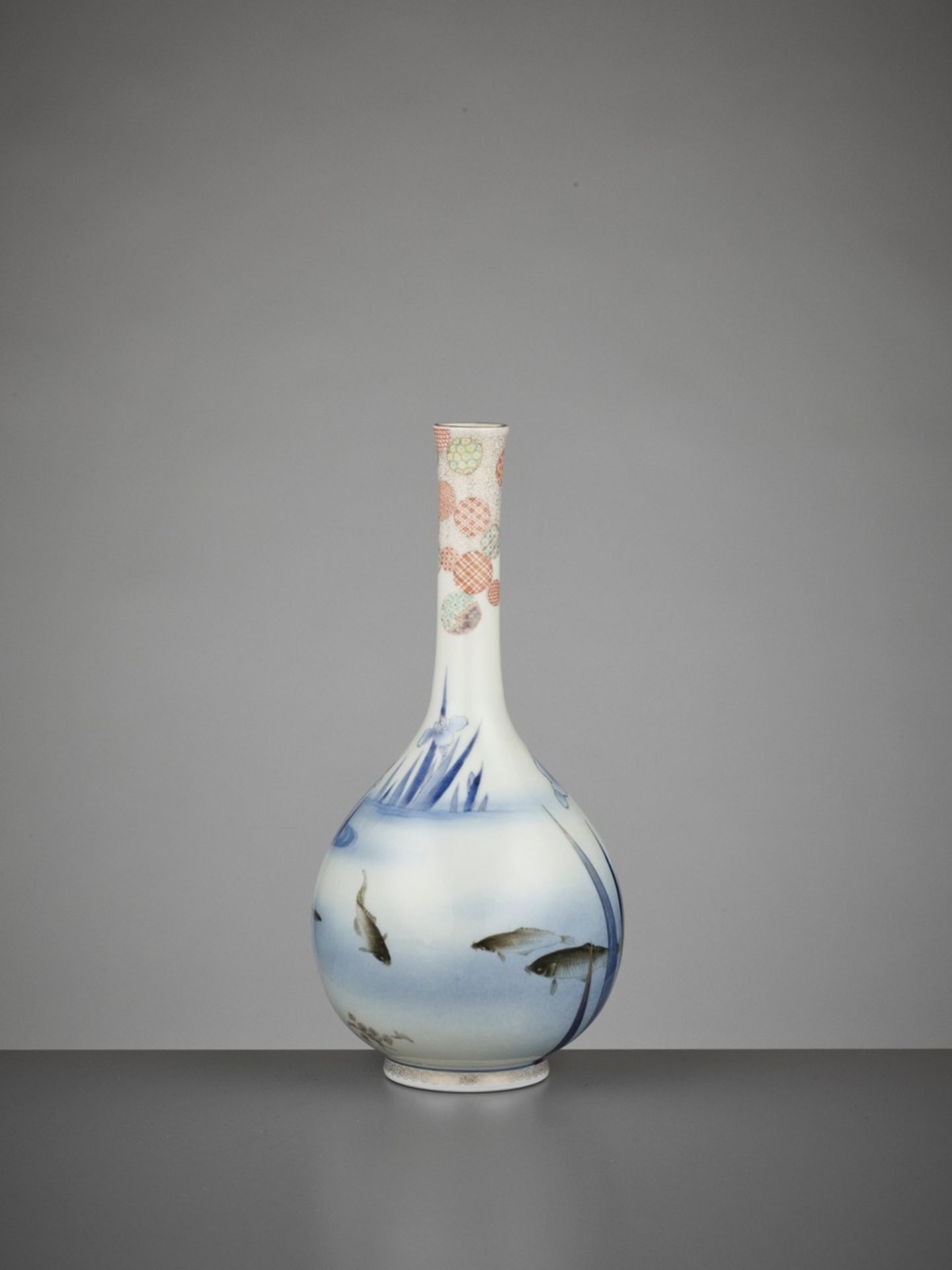 A FINE FUKUGAWA PORCELAIN BOTTLE VASE WITH CARPS AND IRIS By the Fukugawa company, signed Dai Nippon