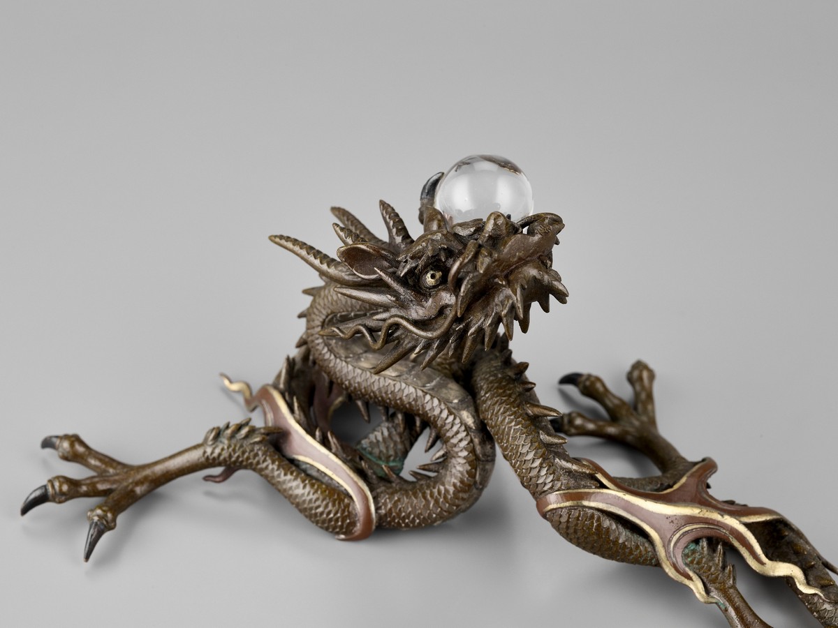 A BRONZE OKIMONO OF A DRAGON WITH ROCK CRYSTAL BALL Japan, Meiji period (1868-1912)Finely cast as - Image 9 of 10