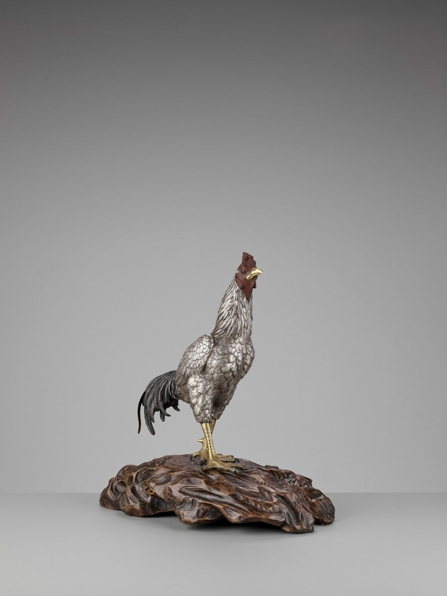 SEIYA: AN UNUSUAL AND RARE PARCEL-GILT SILVERED BRONZE OKIMONO OF A COCKEREL By Genryusai Seiya, - Image 10 of 14