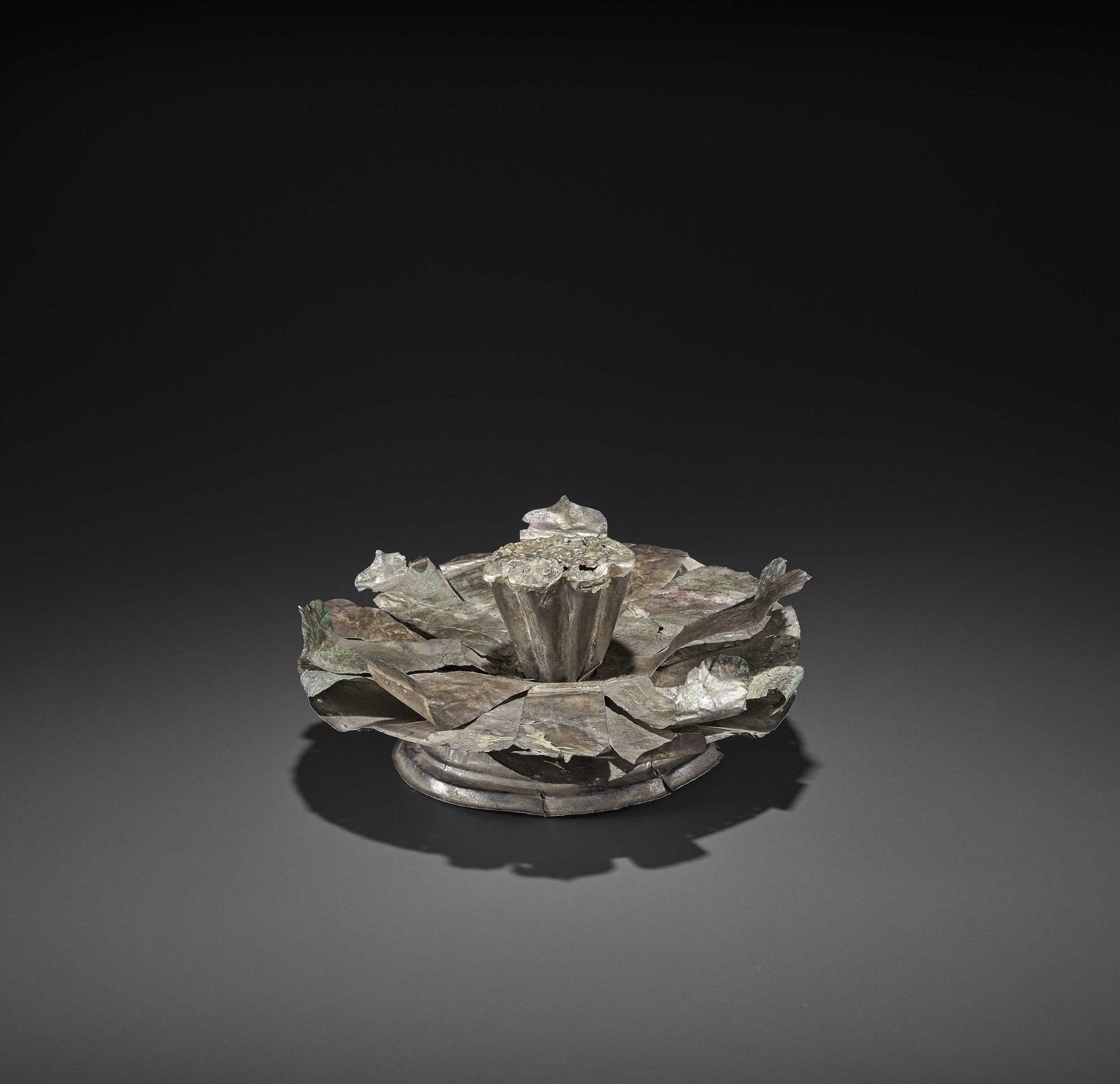 AN EXCEPTIONAL CHAM SILVER REPOUSSÉ ‘OPEN LOTUS’ RITUAL OBJECT