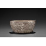 A VERY RARE AND FINE CHAM SILVER REPOUSSÉ BOWL WITH GARUDAS AND PHOENIXES