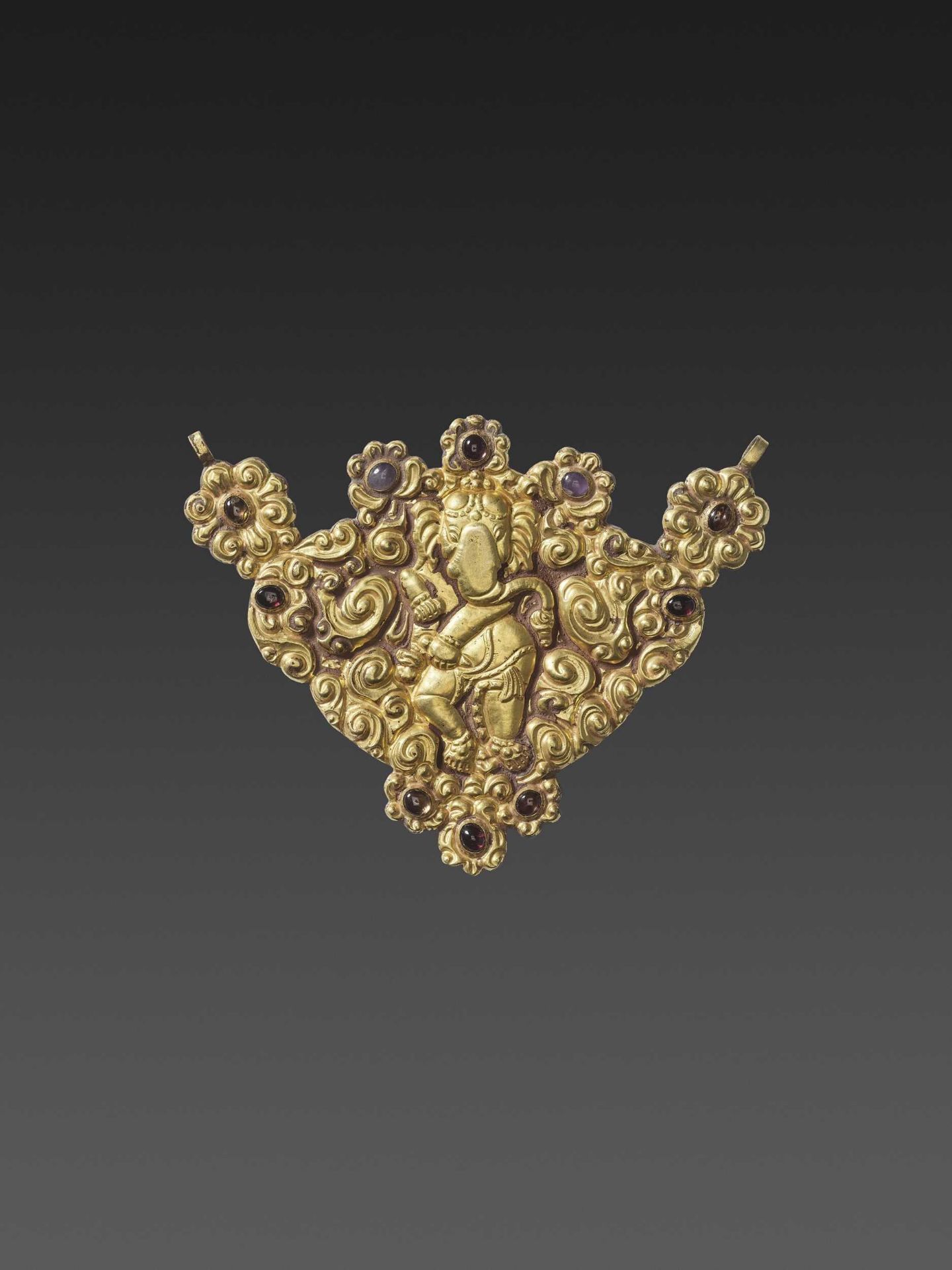 A CHAM GEMSTONE-SET GOLD REPOUSSÉ PECTORAL DEPICTING GANESHA DANCING