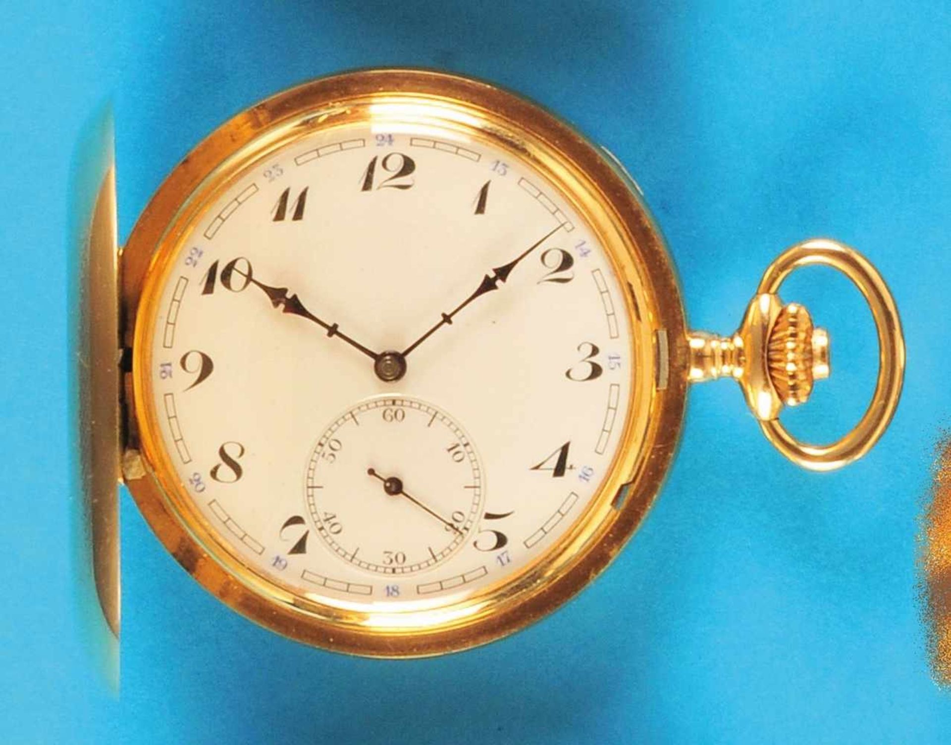 Gold pocket watch with spring cover