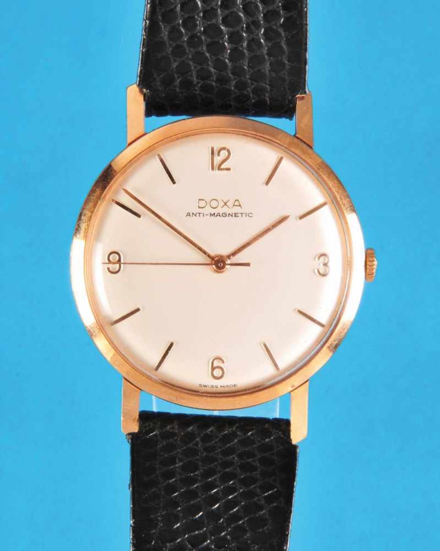 Gold wristwatch, Doxa