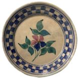Majolica plate of Caltagirone, Sicily, early twentieth century. With flowers in the colors of blue