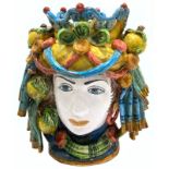 Ceramics of Caltagirone, XX century. Testa di moro, two-faced. H cm?cm 20