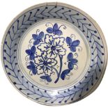 Majolica plate of Caltagirone, Sicily. XX century. In blue colors. Diameter 37 cm.