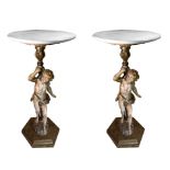Pair of lacquered and gilded Gueridon with cherubs regents circular marble base, early twentieth